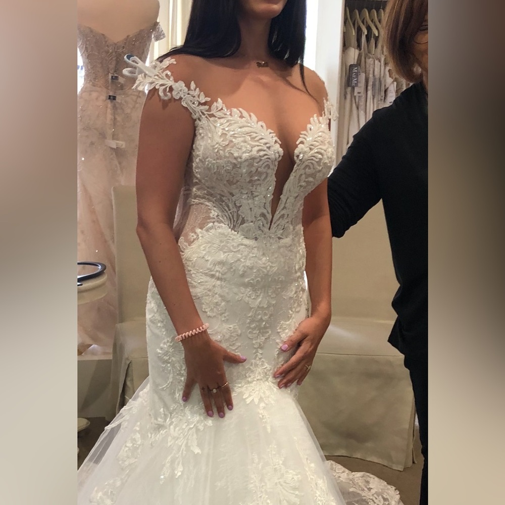 Martina Liana Wedding Dress never worn tags still on it .$1200.00